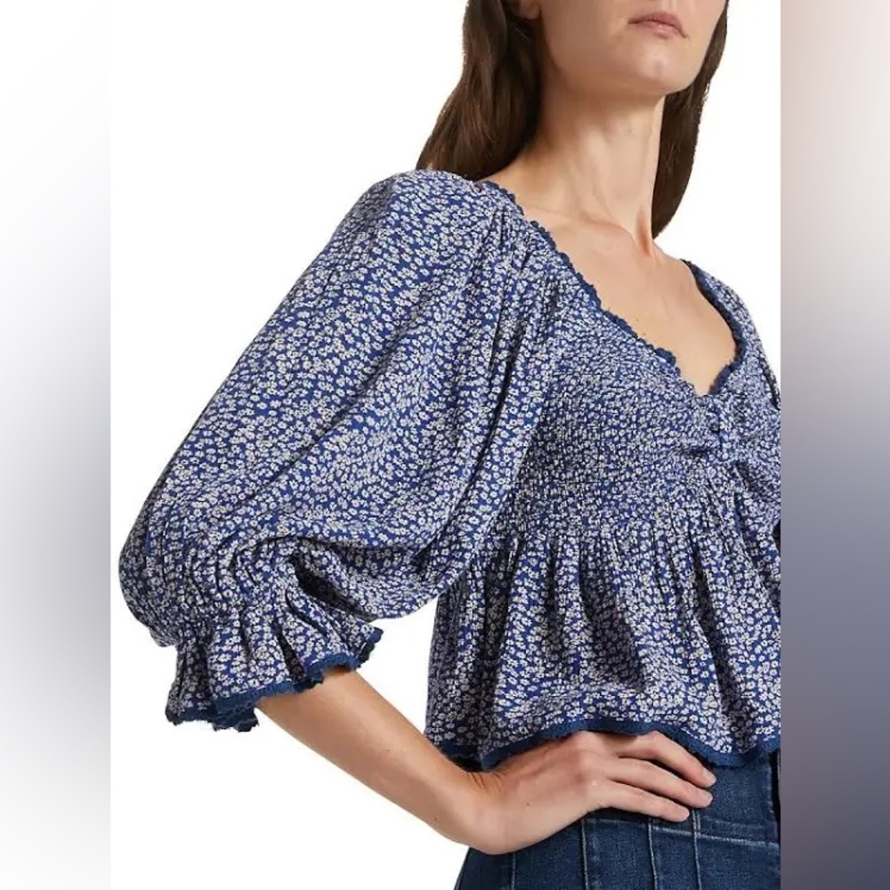 Free People Brittnee Printed Top in the color Blue Combo. NWT size Medium.